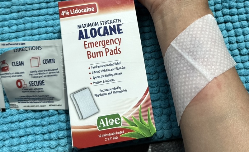 alocane emergency burn pad applied on an arm burn