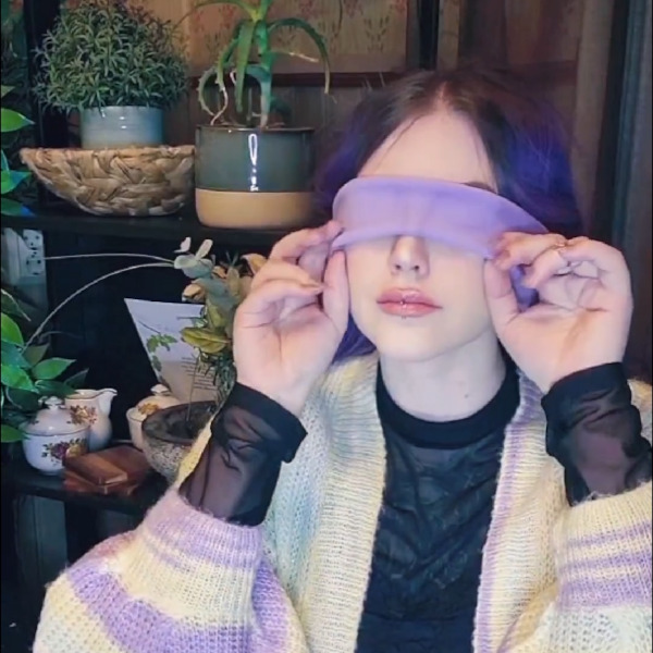 blackthorn witch wears sleepphones headphones as an eye mask