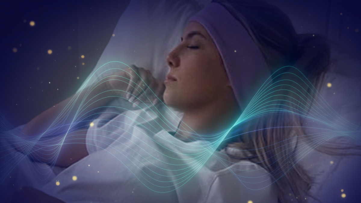 woman using our SleepPhones® sleep headphones to listen to restful sounds as she sleeps