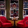 chairs at the window in a festive coffee shop