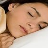 woman practicing good sleep hygiene