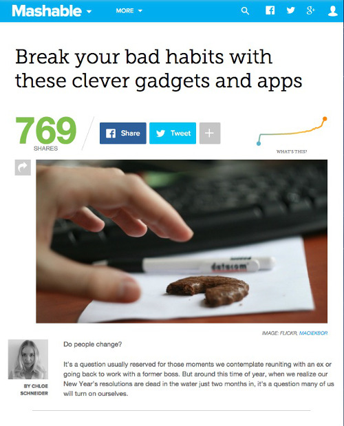 screenshot of Mashable homepage of a hand grabbing for a cookie