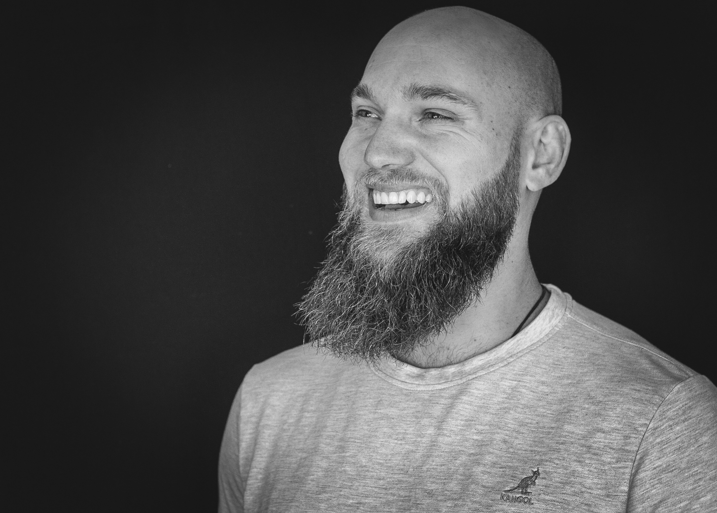 Black and white photo of Matt Belair smiling
