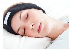 woman resting with sleepphones headband headphones