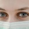 a doctor and business owner wearing a face mask