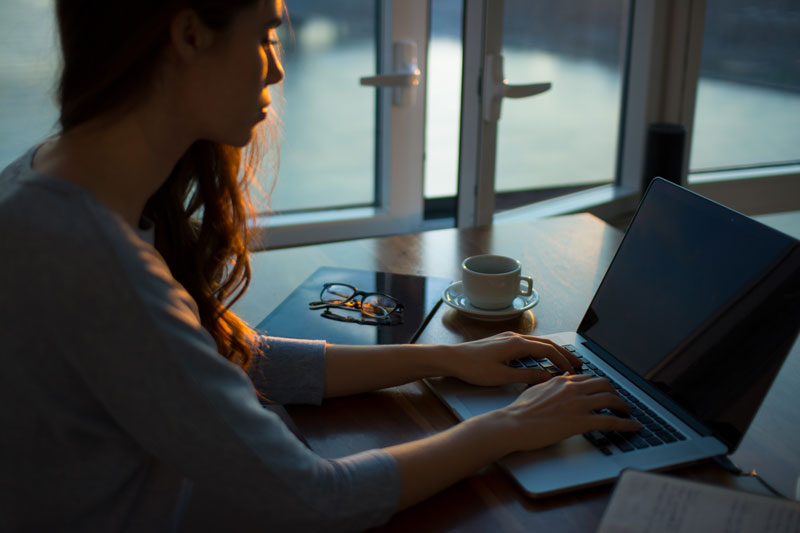 woman working remotely coronavirus soft quarantine